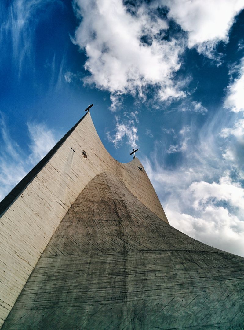 Modern Church with Cross in Minimalist Architecture against Blue Sky - Free Images, Stock Photos and Pictures on Pikwizard.com