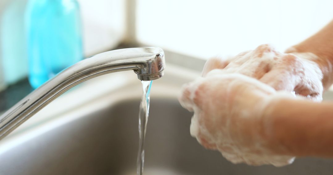 Person Washing Hands in Sink with Running Water - Free Images, Stock Photos and Pictures on Pikwizard.com