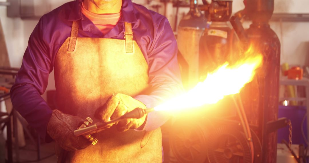 Industrial Worker Operating Welding Torch in Workshop - Free Images, Stock Photos and Pictures on Pikwizard.com