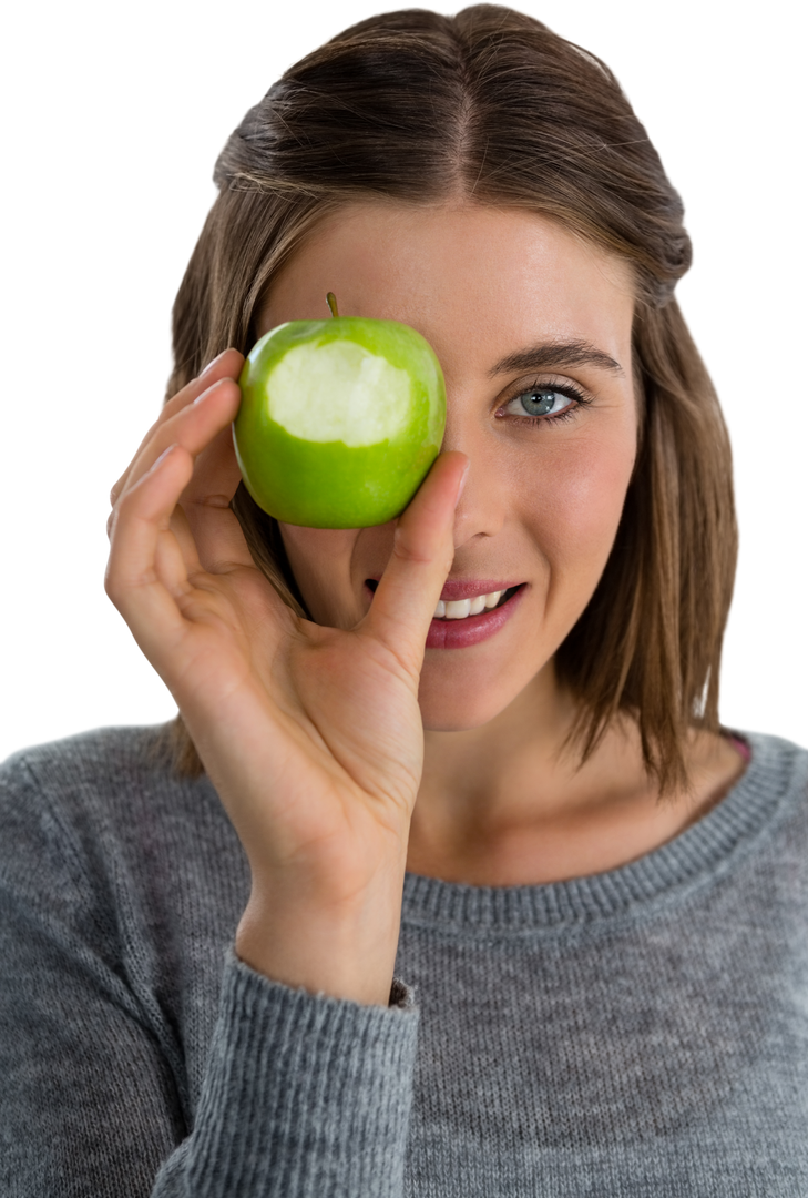 Young Woman Holding Transparent Granny Smith Apple with Bite Taken Out - Download Free Stock Images Pikwizard.com