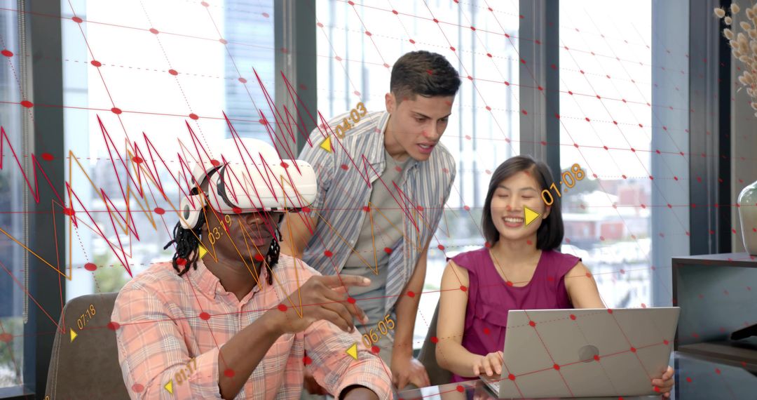 Diverse Team Collaborating with VR Headset and Laptop Displaying Augmented Data Overlays