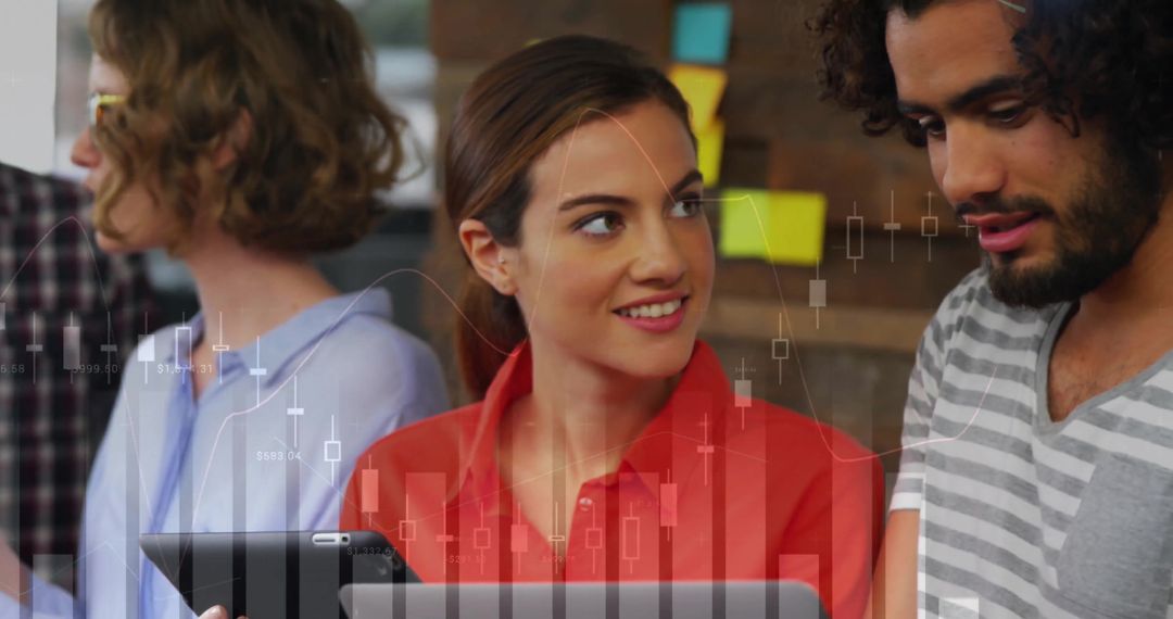 Diverse Colleagues Using Tablet with Digital Interface Graphics