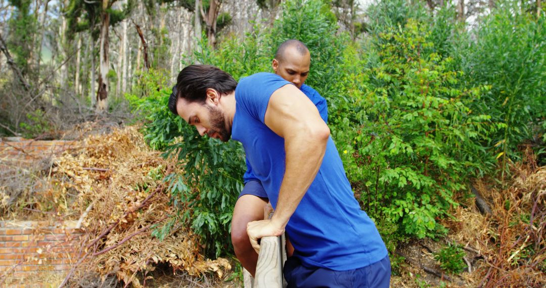 Two Men Engaging in Emergency Response Assistance Outdoors - Free Images, Stock Photos and Pictures on Pikwizard.com