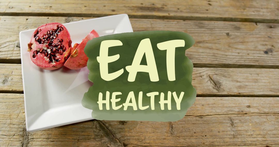 Eat Healthy Concept with Pomegranate and Text Overlay