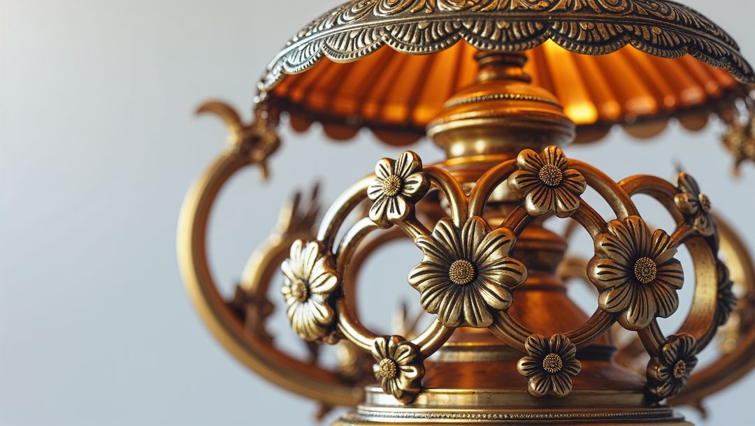 Ornate bronze lamp with floral design and pleated lampshade, vishu festival