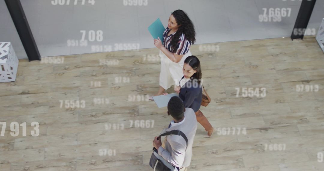 Diverse Professionals Walking Through Digital Data Patterns