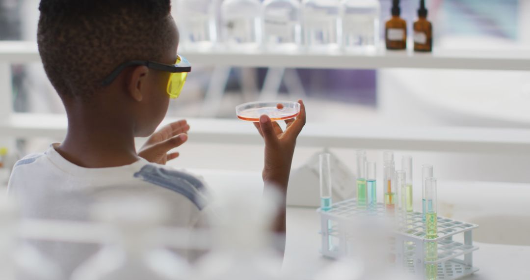 Young Scientist Conducting Experiment in Laboratory - Free Images, Stock Photos and Pictures on Pikwizard.com