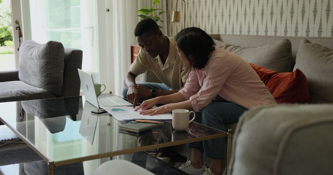 Couple Discussing Plans in Comfortable Living Room Setting