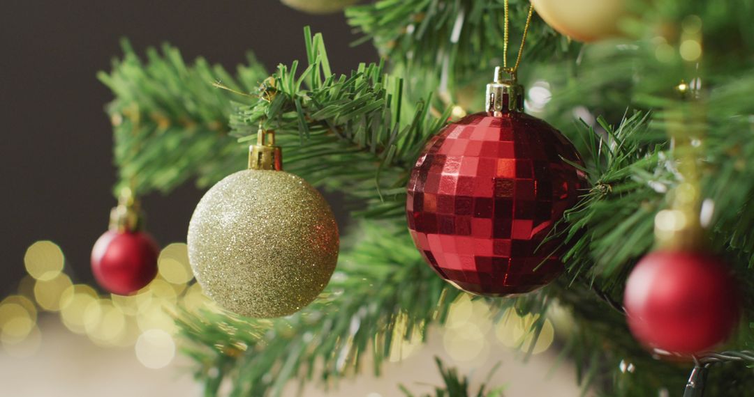 Festive Christmas Tree with Red and Gold Baubles and Twinkling Lights