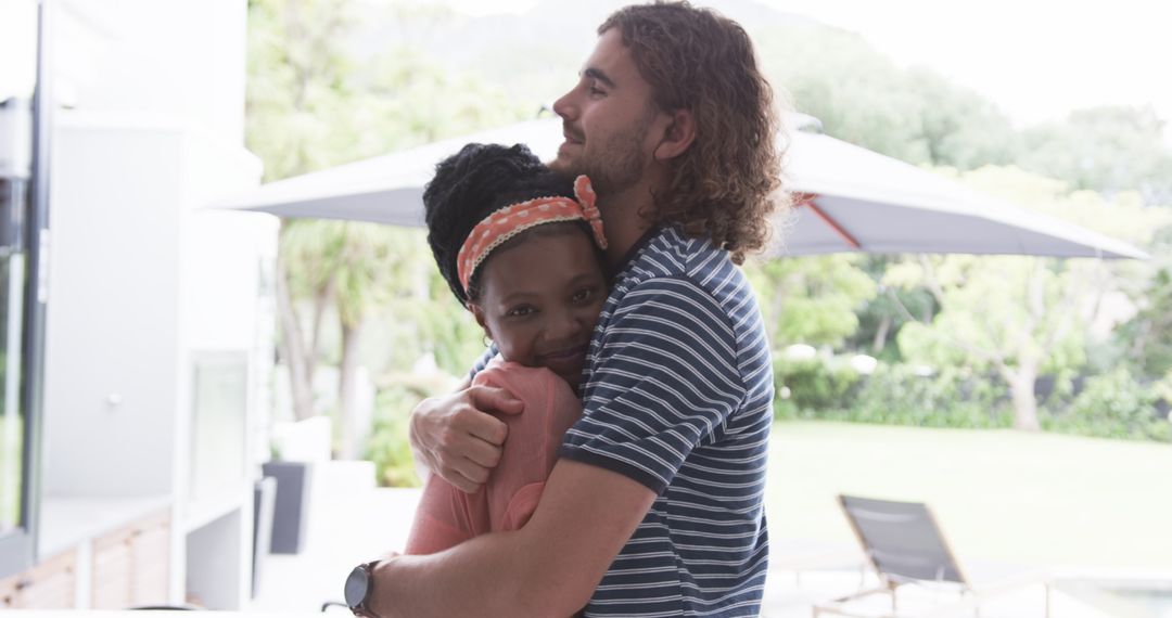 Diverse Couple Embracing in Loving Home Environment