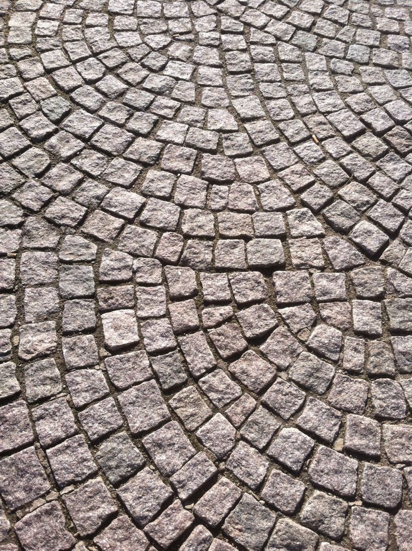 Intricate Stone Cobblestone Path Pattern with Circular Design - Free Images, Stock Photos and Pictures on Pikwizard.com