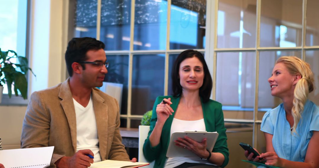 Diverse Business People Collaborating in Office Meeting