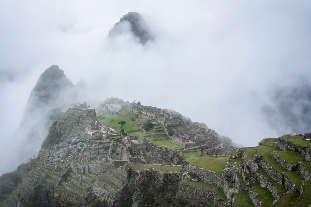 Misty Morning View of Machu Picchu Enveloped in Clouds - Free Images, Stock Photos and Pictures on Pikwizard.com