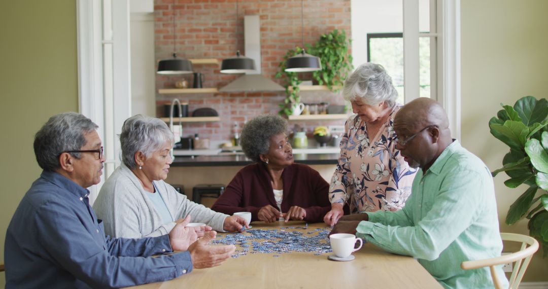 Group of Seniors Enjoying Puzzle Activity at Home - Free Images, Stock Photos and Pictures on Pikwizard.com