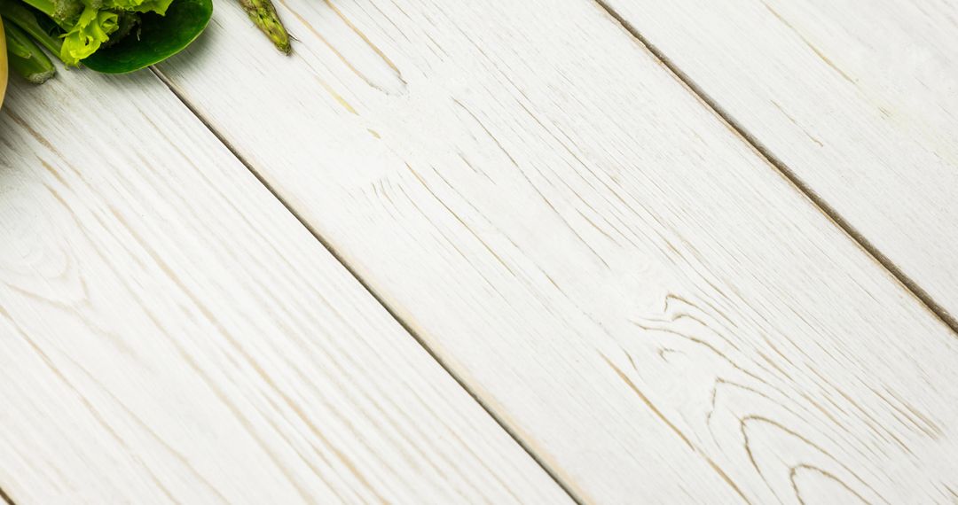 Healthy Raw Green Vegetables on Rustic Wood Table