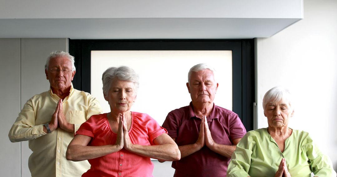 Senior Group Meditating with Eyes Closed in Yoga Class - Free Images, Stock Photos and Pictures on Pikwizard.com