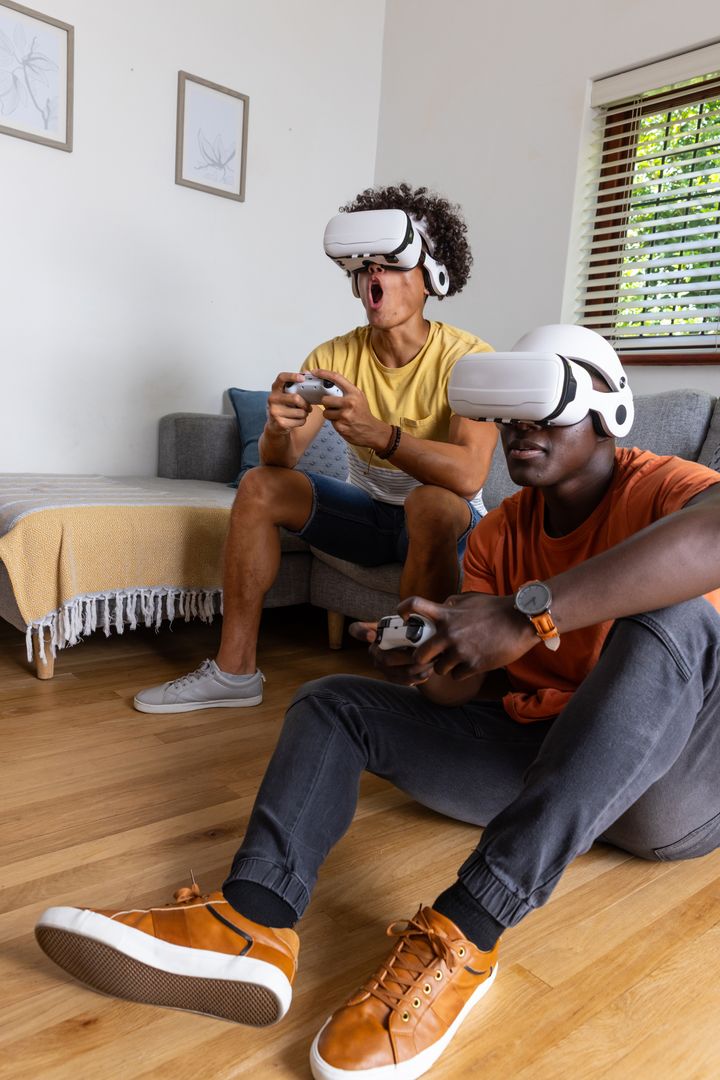 Diverse Friends Playing Virtual Reality with Wireless Controllers in Modern Living Room