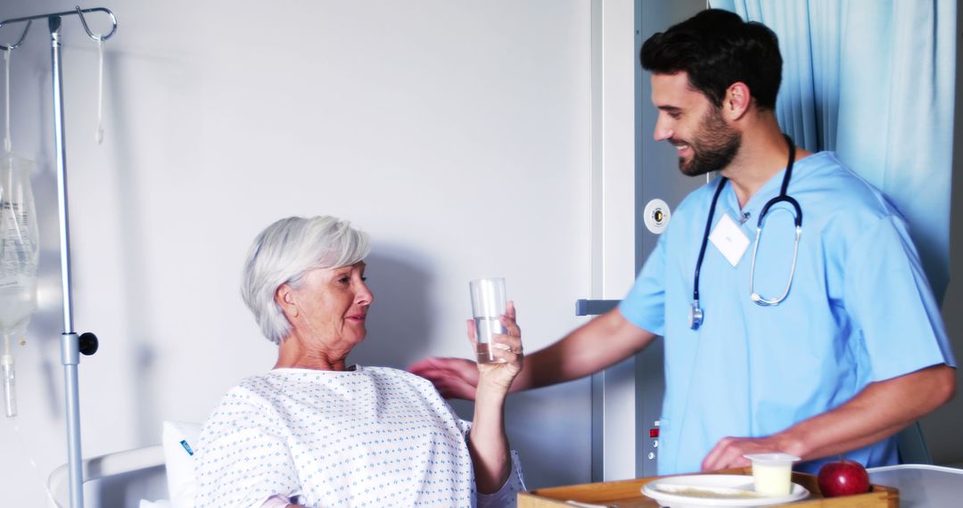 Nurse Assisting Elderly Patient in Hospital Room - Free Images, Stock Photos and Pictures on Pikwizard.com