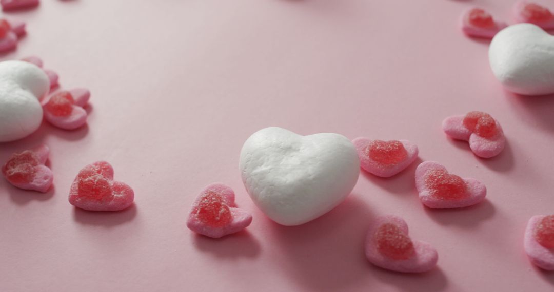 Heart Shaped Sweets on Pink Backdrop for Valentine's Day