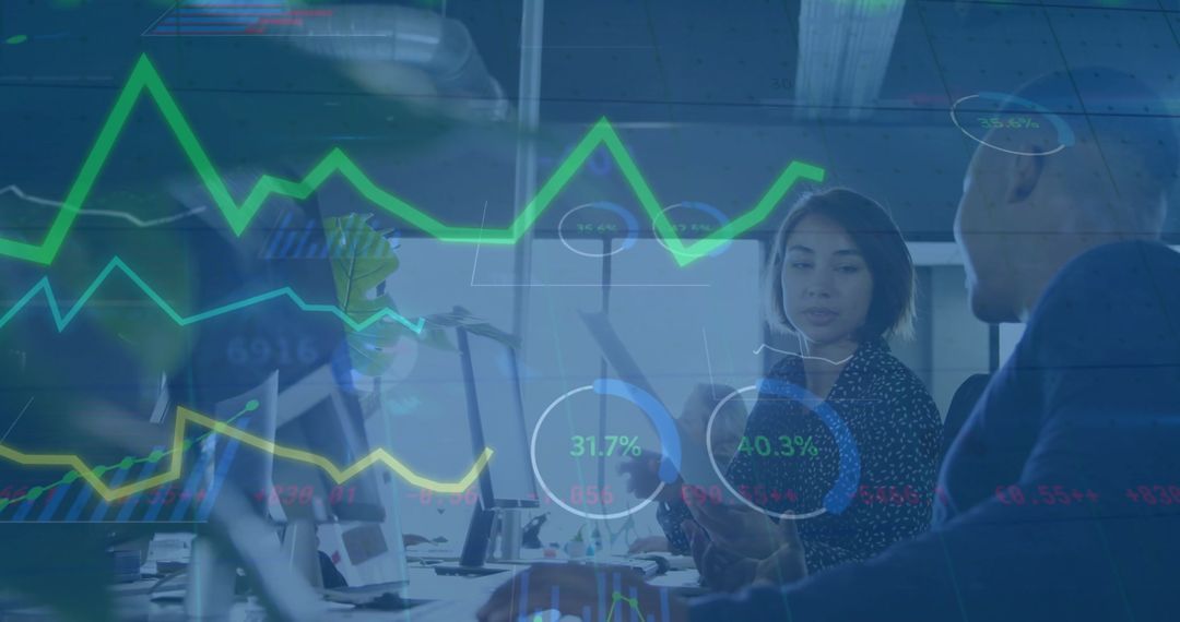 Business Team Collaborating with Digital Interface Graphics