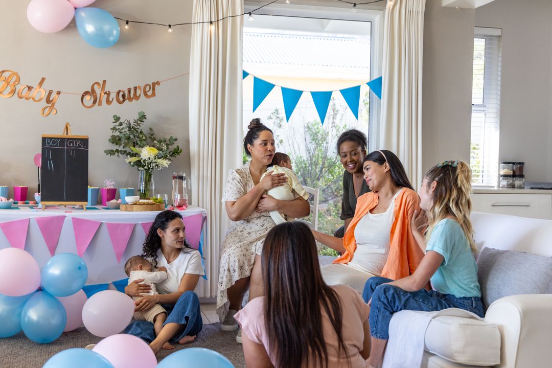 Diverse Group Celebrating Baby Shower with Friendship and Joy