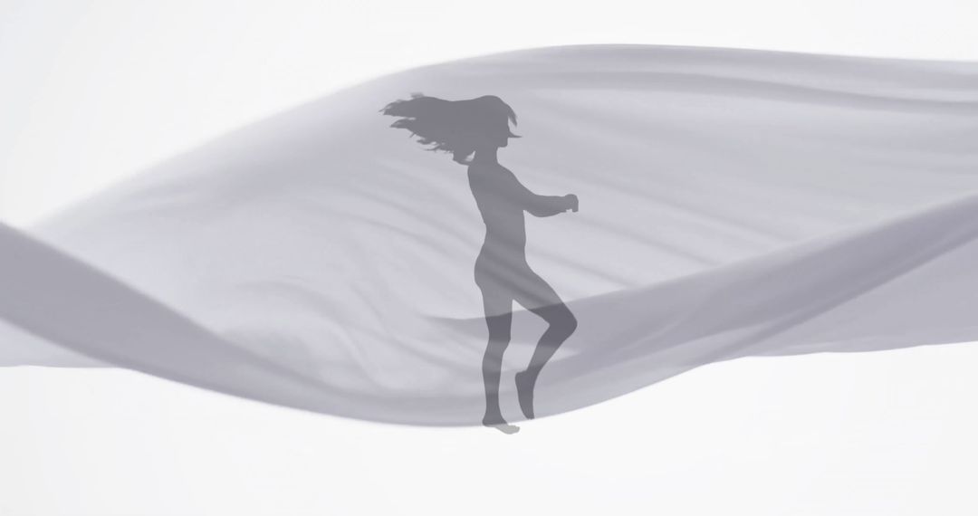 Silhouette of Dancing Woman with Floating Fabric on White Background