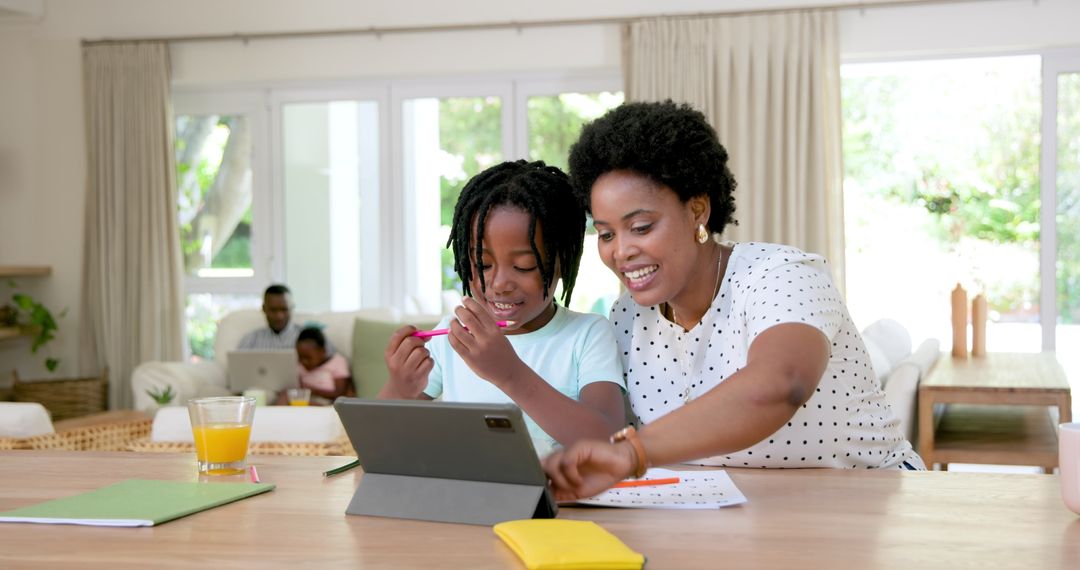 Mother Assisting Son with Homework in Modern Living Room