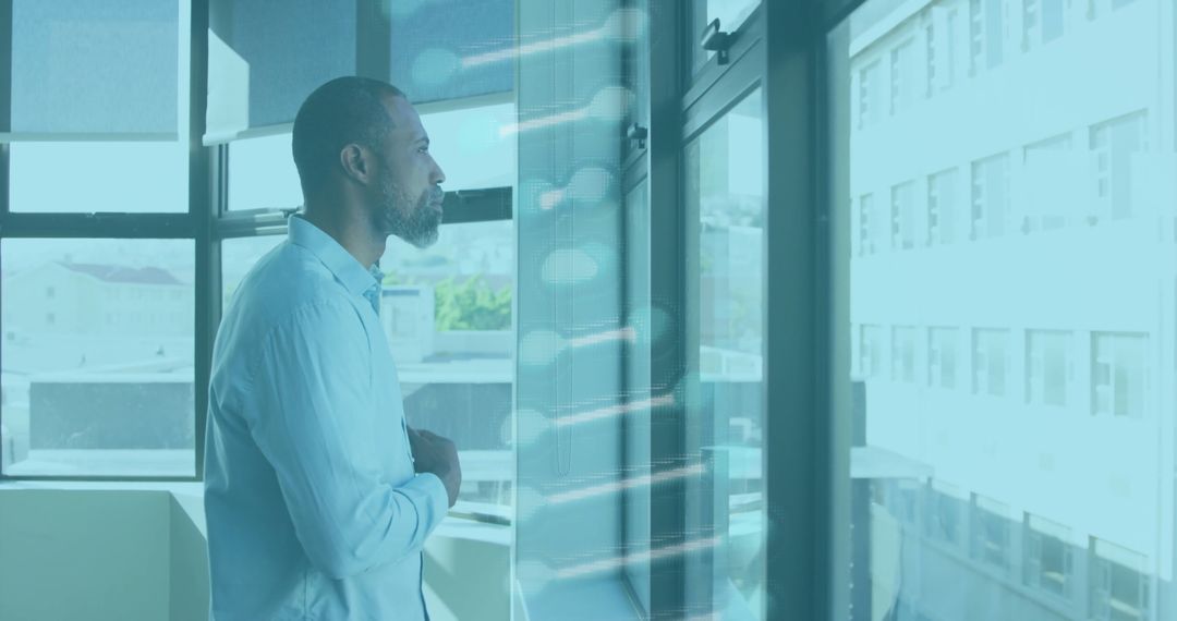 Professional Man Gazing Through Office Window with Digital Circuit Overlay
