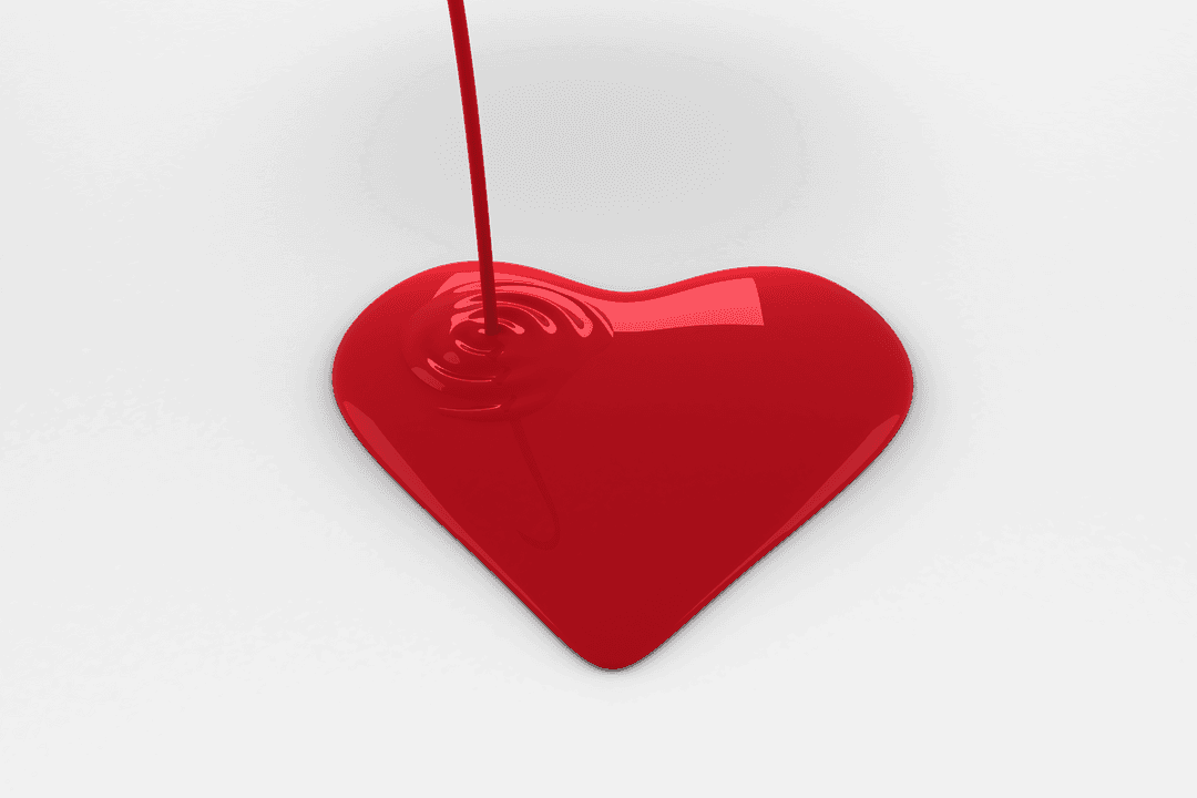 Red Paint Pouring into Heart on Transparent Background