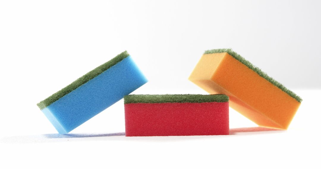 The image of stacked, vibrant sponges against a white backdrop suits cleaning-related themes. - Free Images, Stock Photos and Pictures on Pikwizard.com