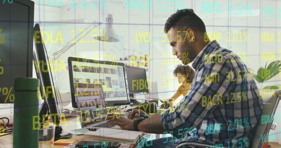 Young Professional Analyzing Data at Modern Desk
