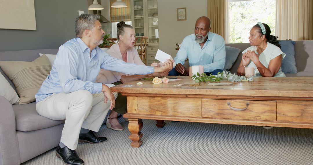 Senior Group Playing Cards at Home in Casual Setting