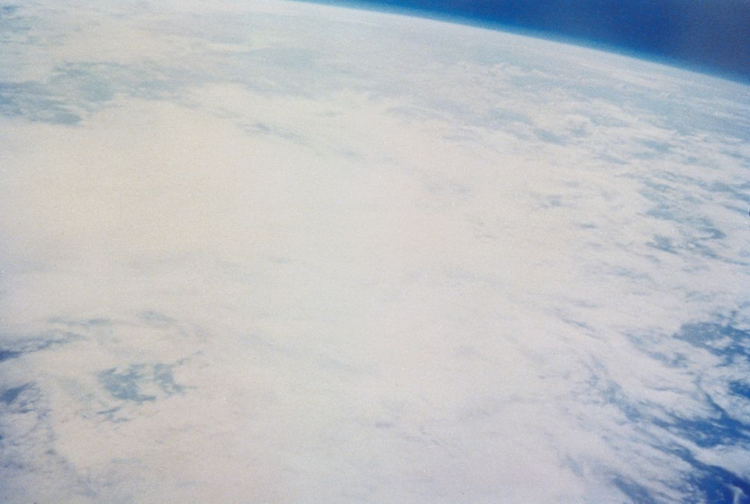View of Earth from Space by Astronaut Scott Carpenter, Mercury-Atlas 7 Mission - Free Images, Stock Photos and Pictures on Pikwizard.com