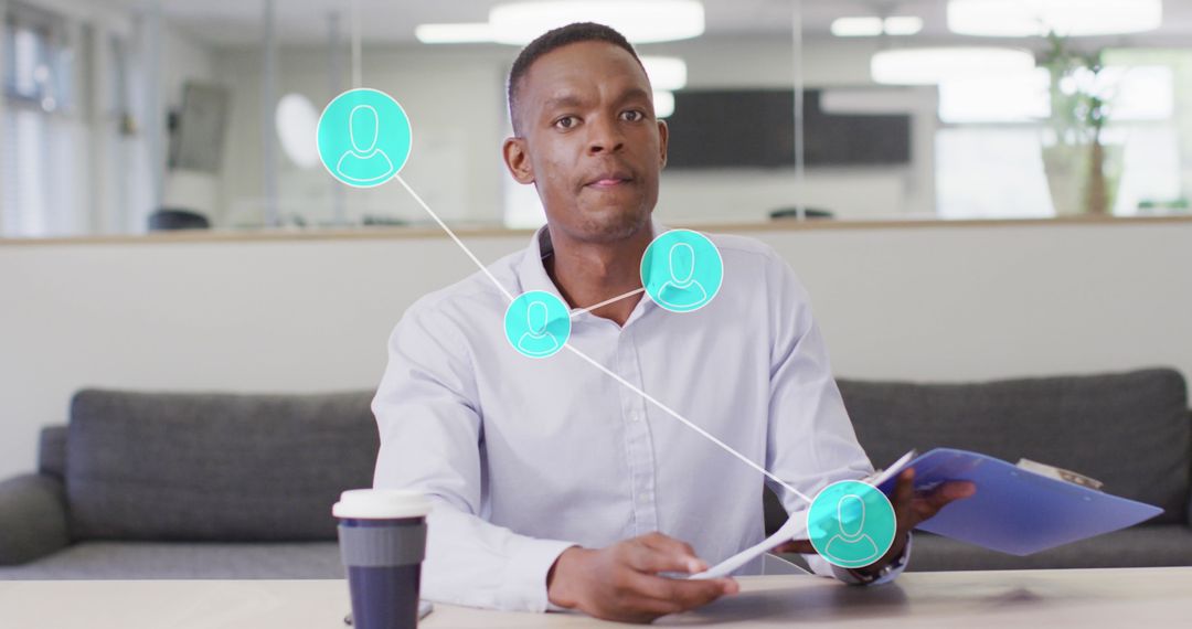 Businessman Analyzing Data With Digital Connections in Office