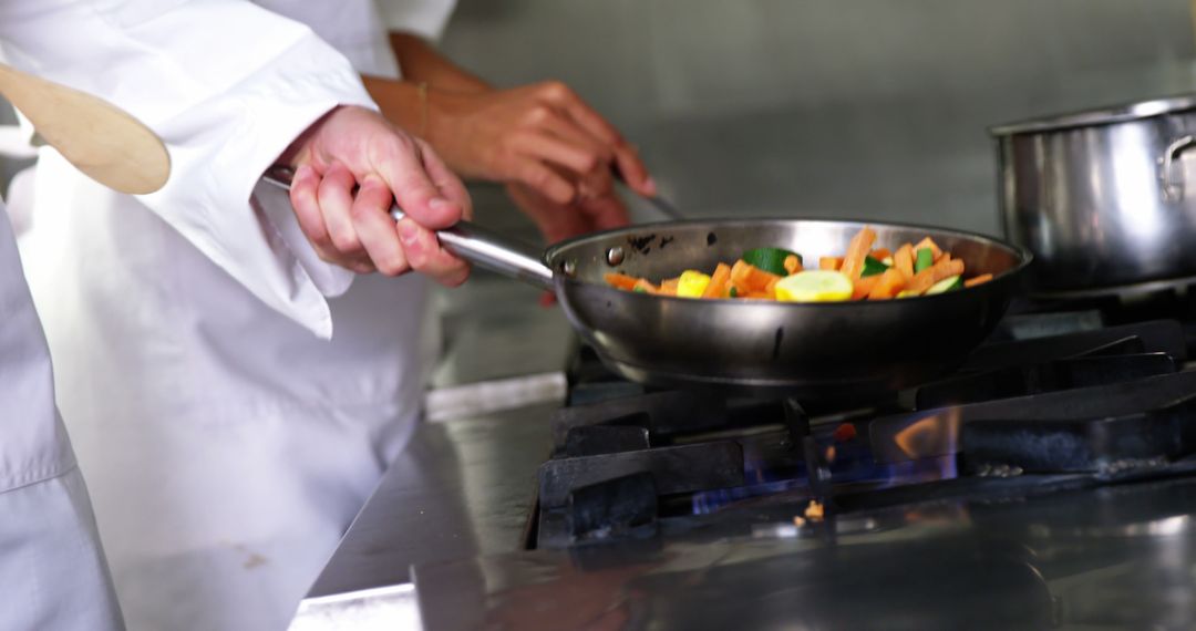 Chefs Preparing Vegetables in Professional Kitchen - Free Images, Stock Photos and Pictures on Pikwizard.com