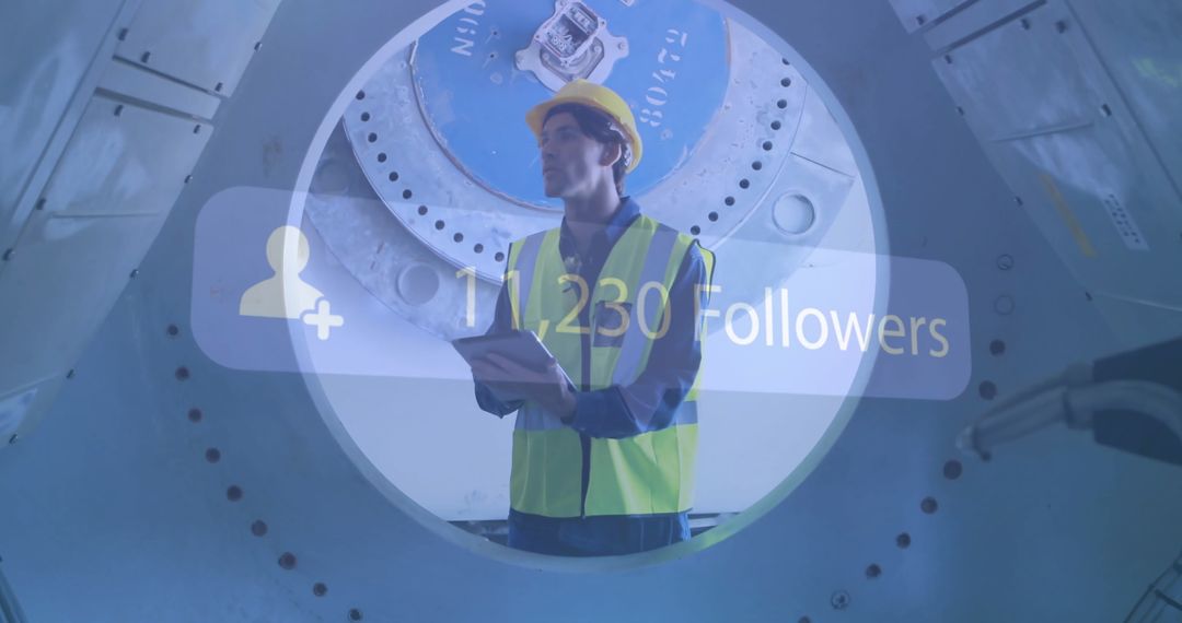 Industrial Worker Checking Machinery with Social Media Overlay