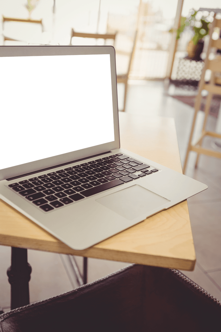 Laptop with Transparent Screen on Cafe Table Modern Workspace