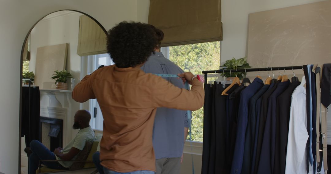 Tailor Adjusting Suit for Wedding Ceremony Preparation