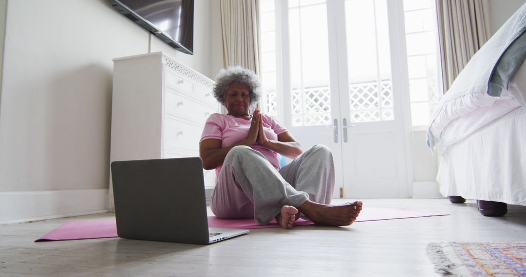 Senior Woman Practicing Online Yoga at Home - Free Images, Stock Photos and Pictures on Pikwizard.com