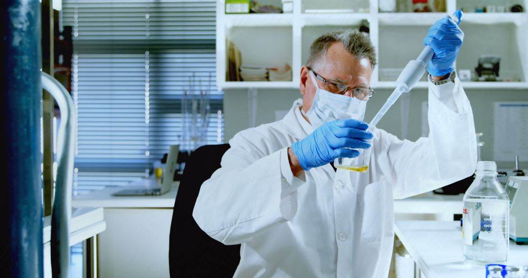 Senior Scientist Conducting Laboratory Research with Pipette