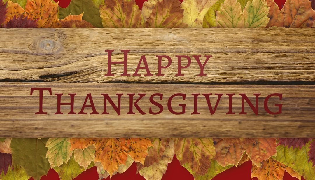 Happy Thanksgiving Message on Rustic Wooden Background