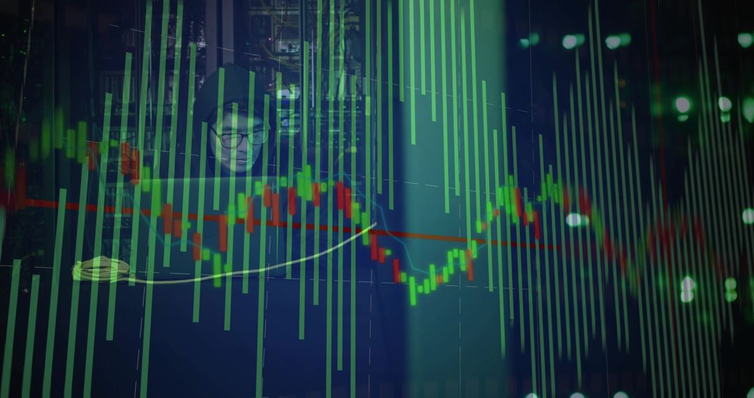 Korean man monitoring market data with candlestick charts and green volume bars