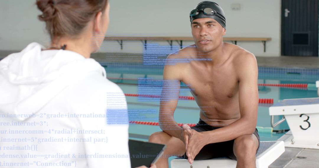 Competitive Swimmer Receiving Coaching on Starting Block During Prerace Strategy Talk
