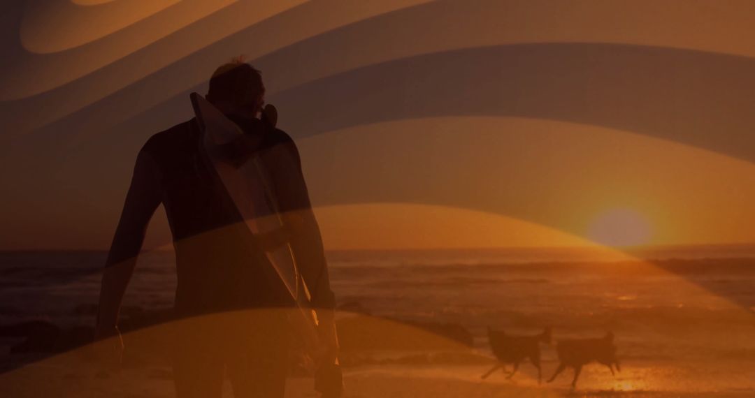 Silhouette of Surfer Walking Along Beach at Sunset