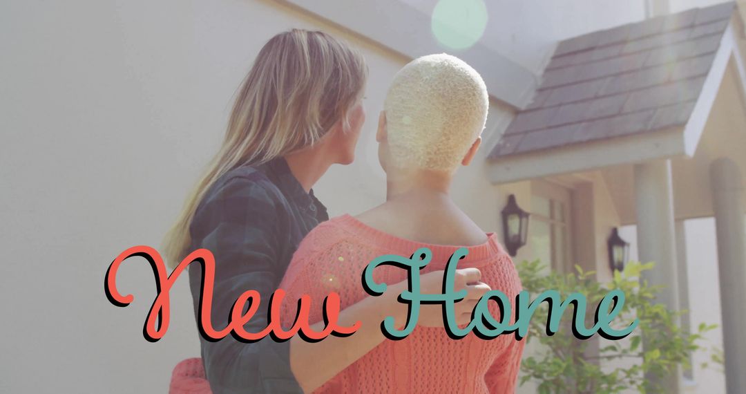 Loving Couple Embracing in Front of Their New Home