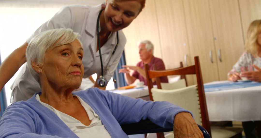 Nurse Assisting Elderly Woman at Retirement Home - Free Images, Stock Photos and Pictures on Pikwizard.com