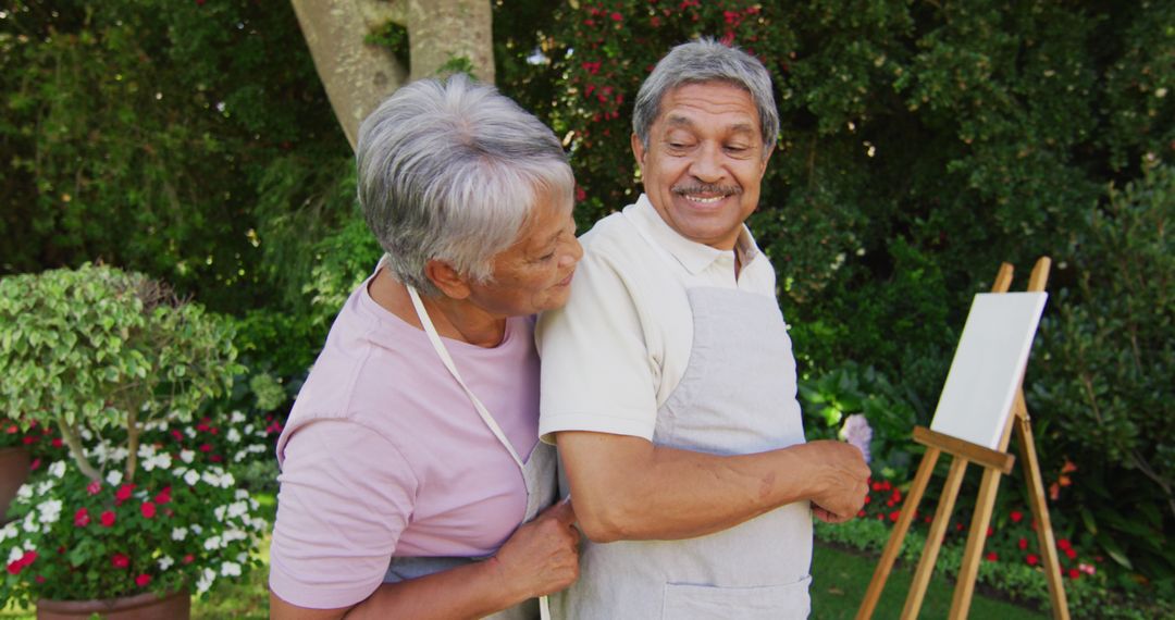 Image of happy biracial senior couple painting in garden - Free Images, Stock Photos and Pictures on Pikwizard.com