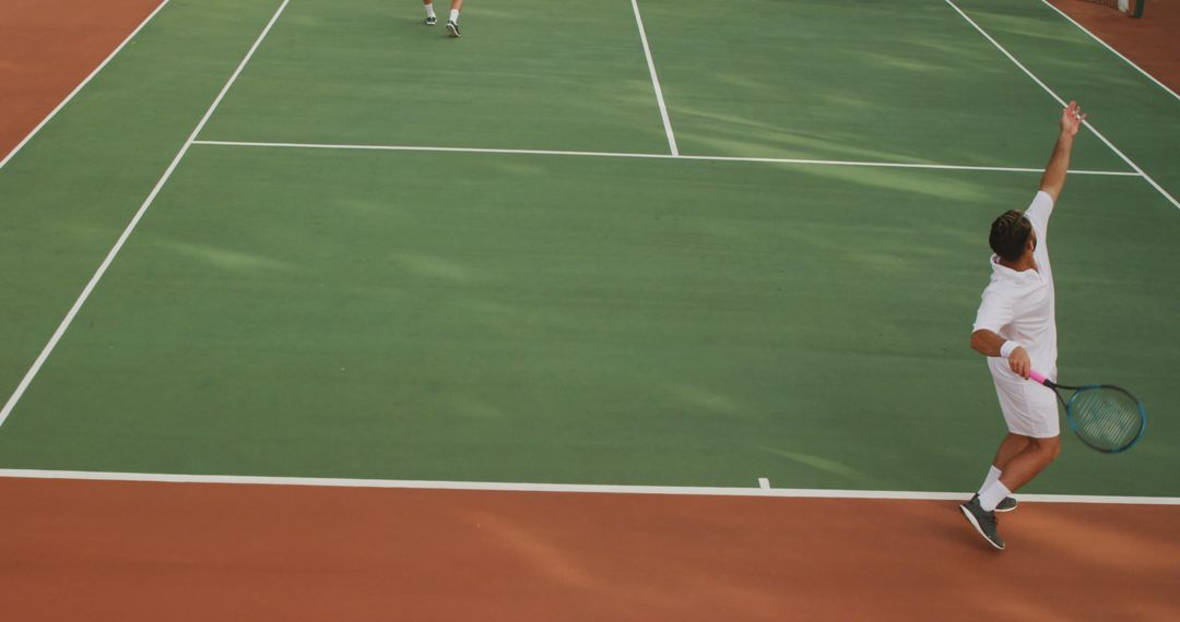 Tennis Players Competing on Outdoor Court - Free Images, Stock Photos and Pictures on Pikwizard.com