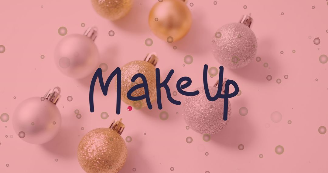 Festive Ornaments with MakeUp Text on Pink Background