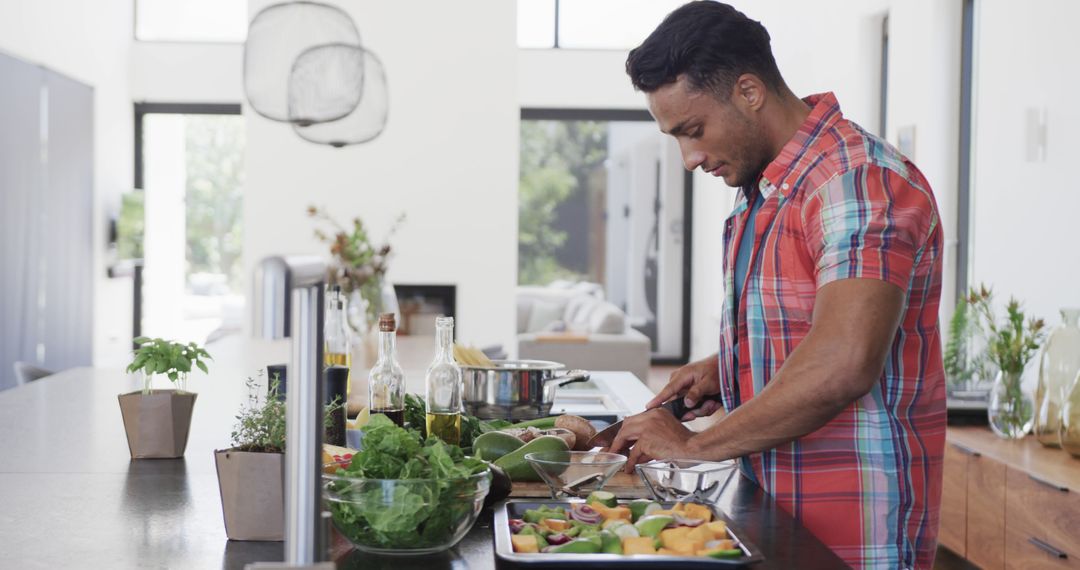 Biracial Man Preparing Fresh Vegetables in Modern Kitchen at Home - Free Images, Stock Photos and Pictures on Pikwizard.com